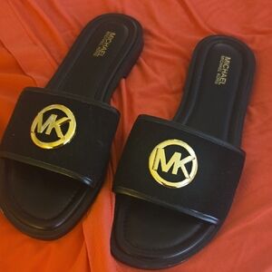 Michael Kors Black Slides with Gold Emblem